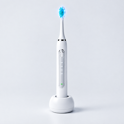 Blue Light Whitening Sonic Toothbrush in white on its charging base with the brush head glowing blue